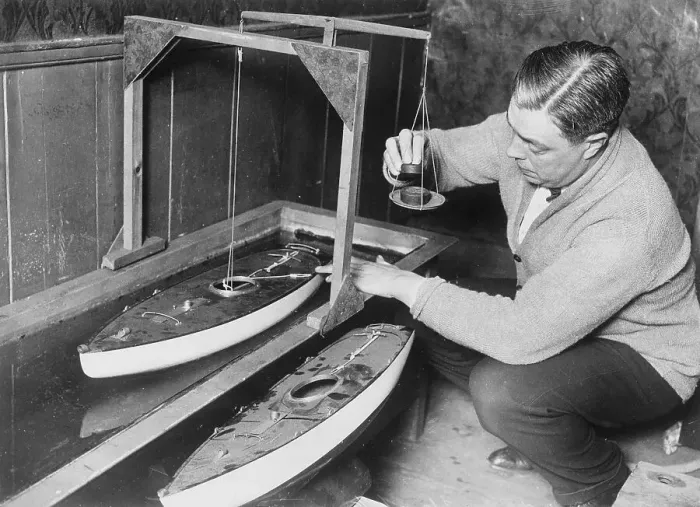 Framed Print : Model Yacht Designer Taking Waterline Reading Framed Print : Model Yacht Designer Taking Waterline Reading