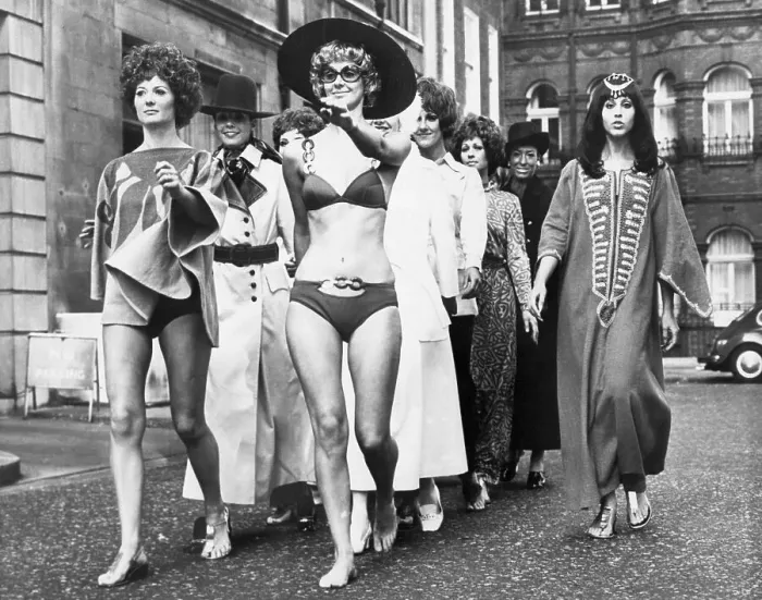 Framed Print : Models Marching Down A Street Framed Print : Models Marching Down A Street