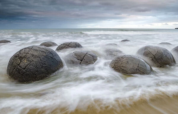 Moeraki Boulders, geological feature, round rock balls, washed by the waves of the surf at high tide, Coastal Otago, Moeraki, South Island, New Zealand, Oceania
