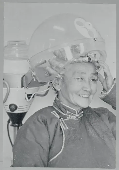 Framed Print : Mongolian Woman Smiling Underneath Hair Dryer Framed Print : Mongolian Woman Smiling Underneath Hair Dryer