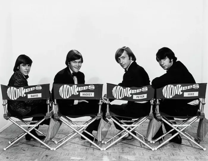 Framed Print : The Monkees Seated In Directors Chairs Framed Print : The Monkees Seated In Directors Chairs