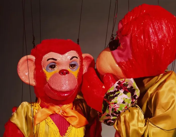 Framed Print : Monkey puppets whispering Framed Print : Monkey puppets whispering