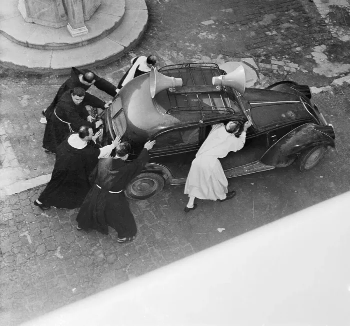 Framed Print : Monks Pushing a Car Framed Print : Monks Pushing a Car