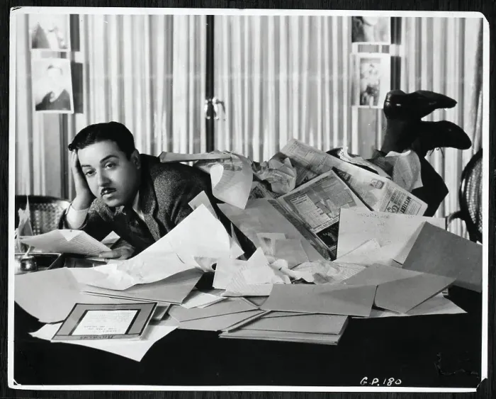 Framed Print : Monty Banks Under Papers