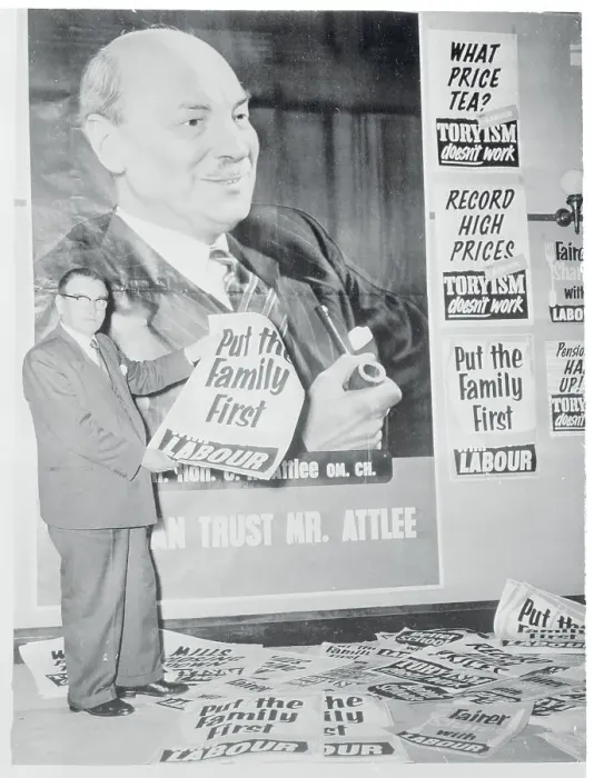 Framed Print : Morgan Phillips Holding a Campaign Poster Framed Print : Morgan Phillips Holding a Campaign Poster