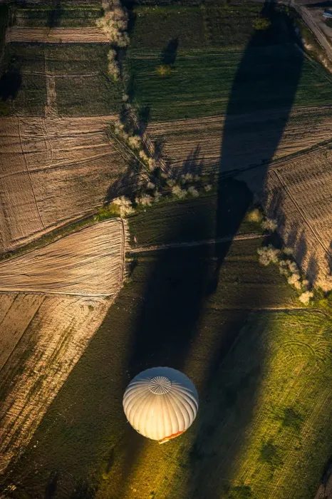 Framed Print : Morning balloon over the field in aerial view