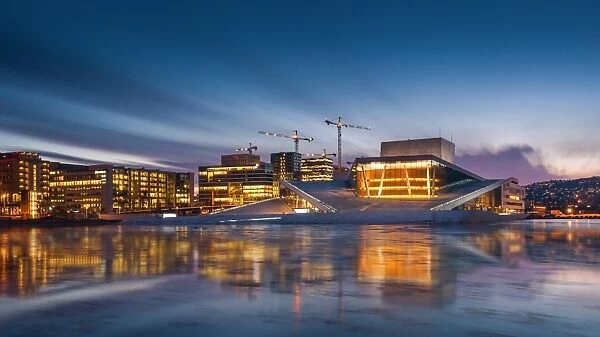 Morning view of Oslo opera house with reflection