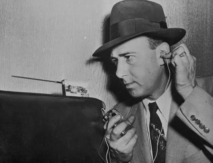 Framed Print : Mort Davis Manipulating Wiretapping Equipment Framed Print : Mort Davis Manipulating Wiretapping Equipment