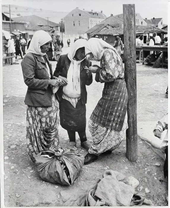 Framed Print : Three Moslem Women Compare Purchases Framed Print : Three Moslem Women Compare Purchases