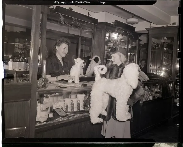 Framed Print : Mother Buying a Toy for Her Daughter Framed Print : Mother Buying a Toy for Her Daughter