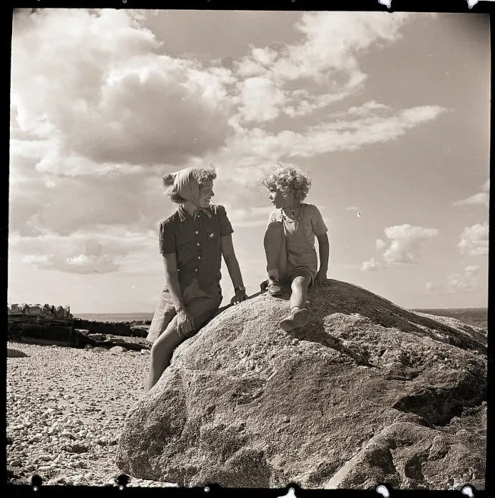 Framed Print : Mother and Child on Rock at Beach Framed Print : Mother and Child on Rock at Beach