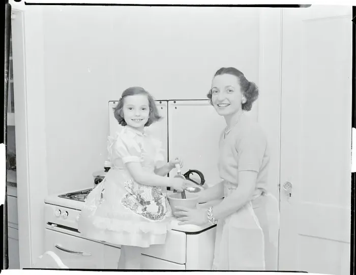 Framed Print : Mother Cooking with Her Daughter Framed Print : Mother Cooking with Her Daughter