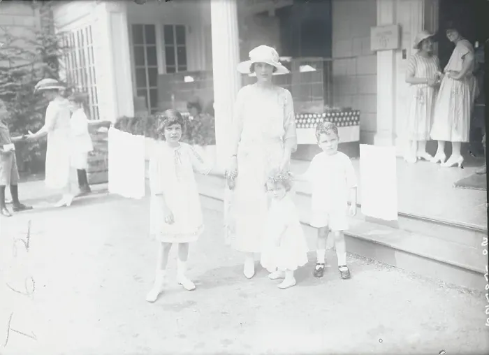 Framed Print : Mother Holding Hands with Her Children Framed Print : Mother Holding Hands with Her Children