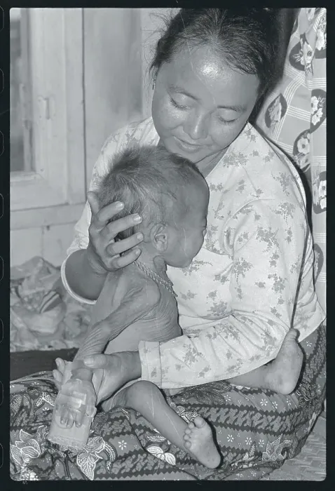 Framed Print : Mother Holding Infant Son Framed Print : Mother Holding Infant Son