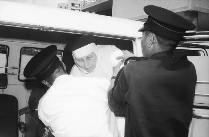 Framed Print : Mother Superior Winfred Duff Being Assisted from Ambulance Framed Print : Mother Superior Winfred Duff Being Assisted from Ambulance
