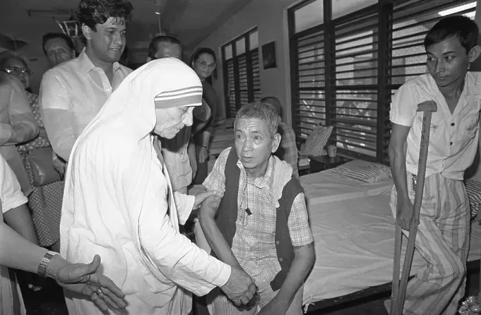 Framed Print : Mother Teresa Showing Compassion to Poor Framed Print : Mother Teresa Showing Compassion to Poor