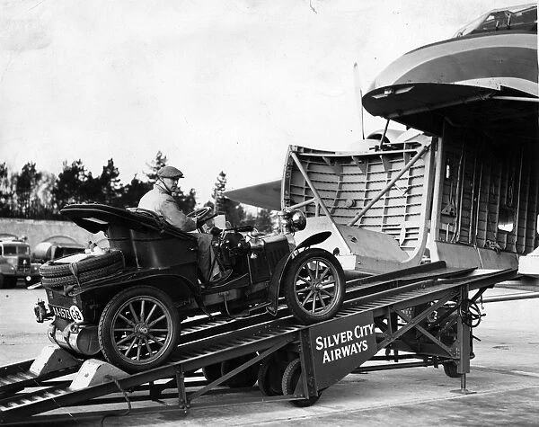Motor Car. circa 1930: Old motor car being loaded on to Silver City Airways aeroplane