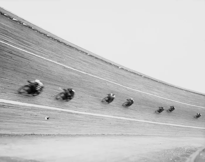 Framed Print : Motorcycles Racing on Sloped Track Framed Print : Motorcycles Racing on Sloped Track