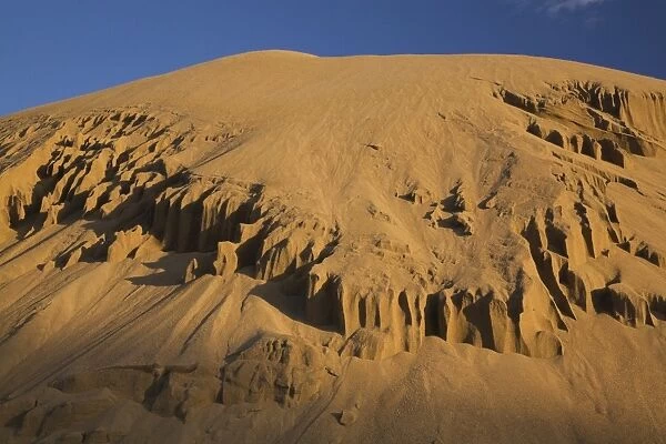 Mound of sand in a commercial sandpit, Quebec, Canada