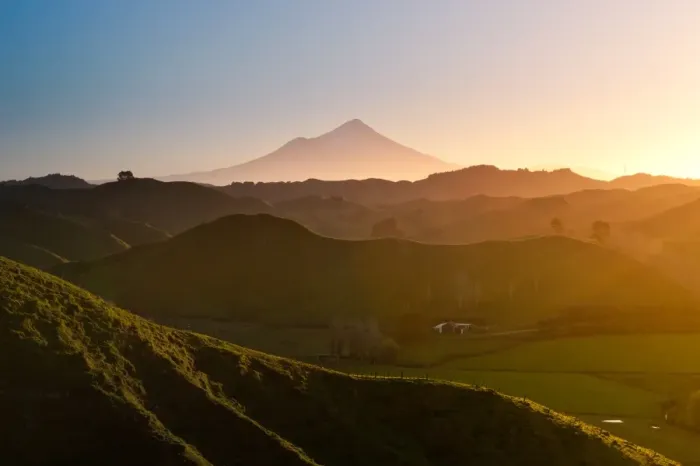 Framed Print : Mount Egmont with hilly countryside Framed Print : Mount Egmont with hilly countryside