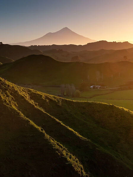 Mount Egmont with hilly countryside in vertical