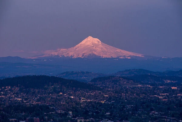 Mount Hood with downtown Portland at dusk