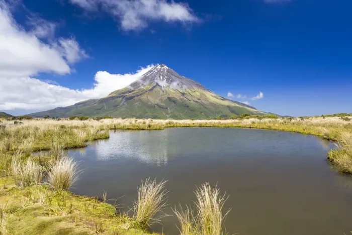 Framed Print : Mountain lake with the Mount Taranaki volcano, Pouakai Range, Egmont National Park, Taranaki Region, New Zealand Framed Print : Mountain lake with the Mount Taranaki volcano, Pouakai Range, Egmont National Park, Taranaki Region, New Zealand