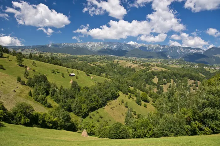 Framed Print : Mountain landscape with meadows in front of mountains, Carpathians, Romania Framed Print : Mountain landscape with meadows in front of mountains, Carpathians, Romania