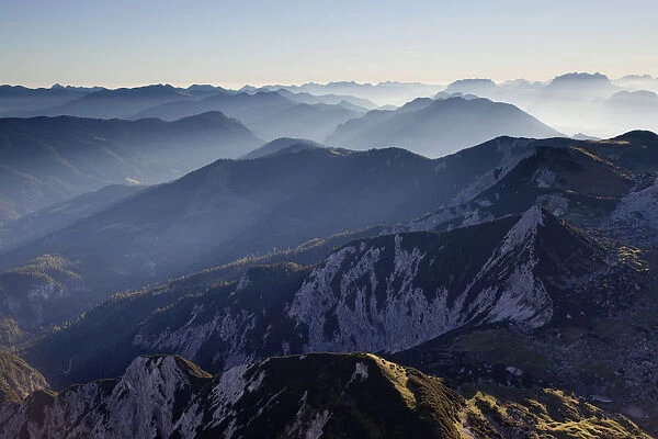 Mountain ridges with backlighting, seen from Hochiss Mountain in Rofan, Maurach, Tyrol, Austria