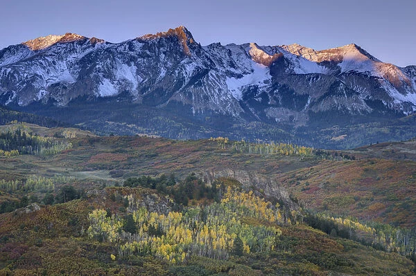 Mountain and valley landscape at sunrise, San Juan Mountains, Colorado, USA