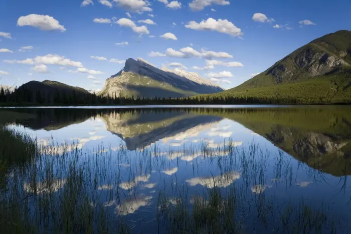 Framed Print : Mountains and clouds reflecting in lake Framed Print : Mountains and clouds reflecting in lake