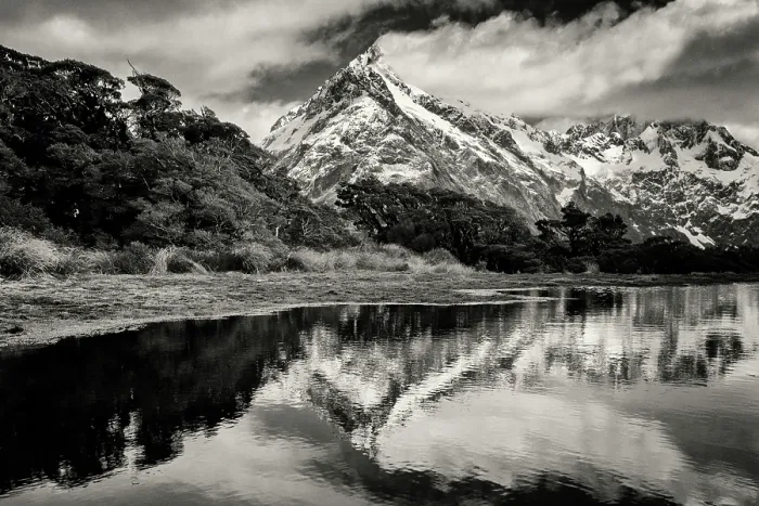 Framed Print : Mountains reflecting in remote lake, Key Summit, Southland, New Zealand Framed Print : Mountains reflecting in remote lake, Key Summit, Southland, New Zealand