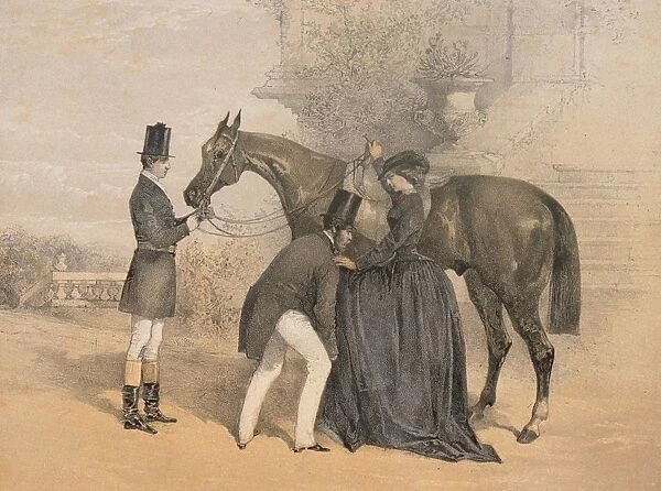 Mounting. 1857: One man holds the horses head while another helps a Victorian
