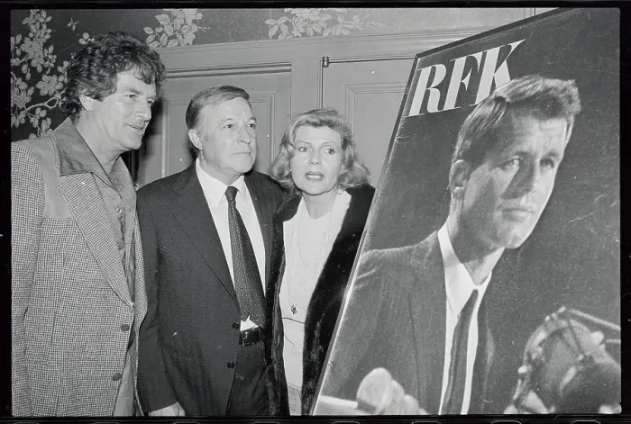 Framed Print : Movie Favorites Standing Near Large Poster