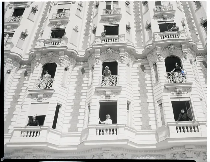 Framed Print : Movie Stars On Balconies Of Hotel Framed Print : Movie Stars On Balconies Of Hotel