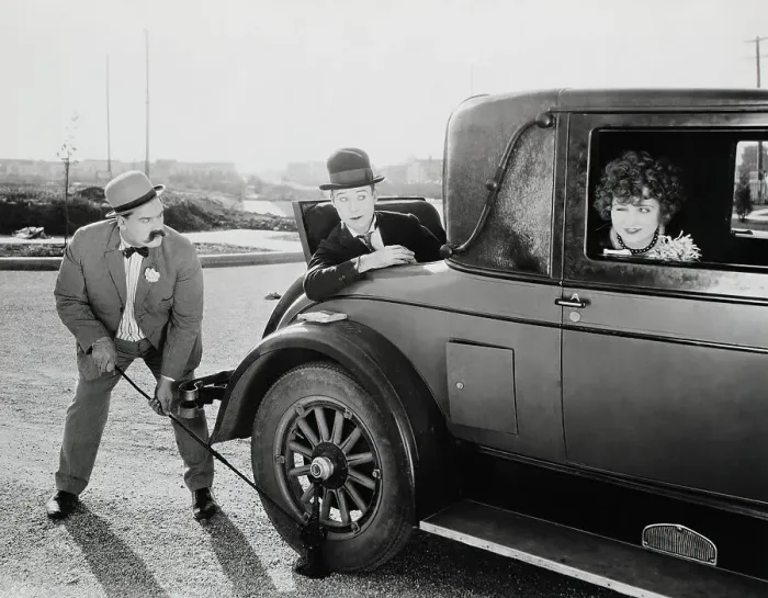 Framed Print : Movie Still;Changing Tire, Using Jack Framed Print : Movie Still;Changing Tire, Using Jack