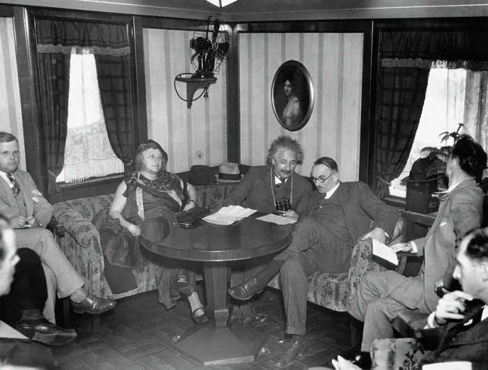 Framed Print : Mr. and Mrs. Albert Einstein on Ship with Reporters