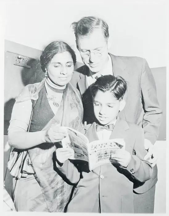 Framed Print : Mr. and Mrs. Harvey Renfrew Reading With Their Son Framed Print : Mr. and Mrs. Harvey Renfrew Reading With Their Son