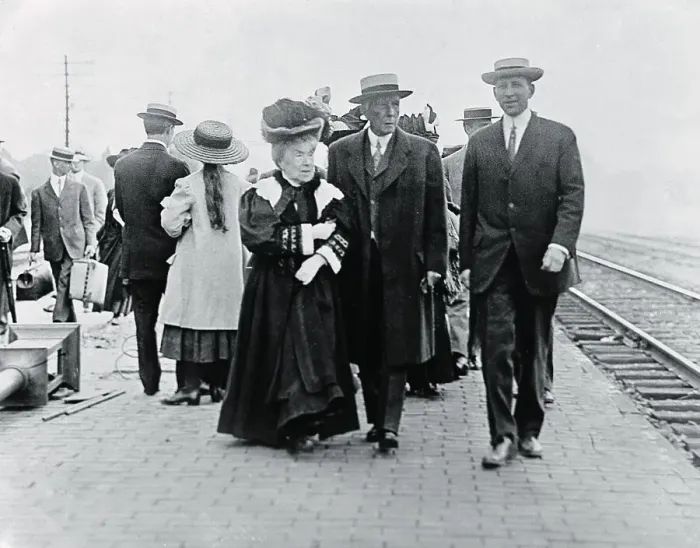 Framed Print : Mr. and Mrs. John D. Rockefeller Sr. Strolling at Train Station Framed Print : Mr. and Mrs. John D. Rockefeller Sr. Strolling at Train Station