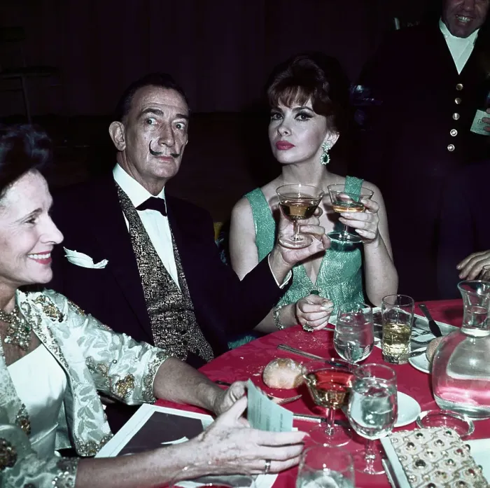 Framed Print : Mr. and Mrs. Salvador Dali Sitting at Table with Gina Lollobrigida Framed Print : Mr. and Mrs. Salvador Dali Sitting at Table with Gina Lollobrigida