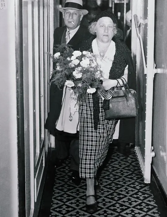 Framed Print : Mrs. Albert Einstein Walking with Bouquet of Flowers Framed Print : Mrs. Albert Einstein Walking with Bouquet of Flowers