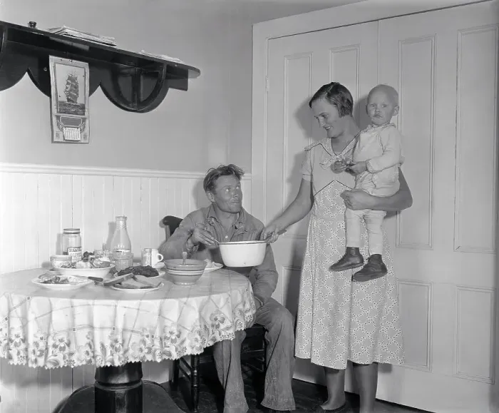 Framed Print : Mrs. Gus Axelson Serving a Meal to Her Husband