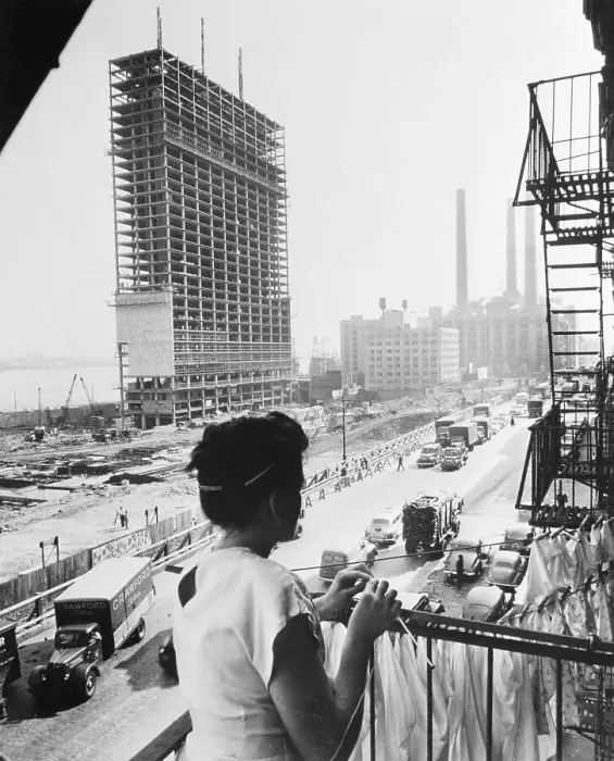 Framed Print : Mrs James Rath Watching United Nations Construction