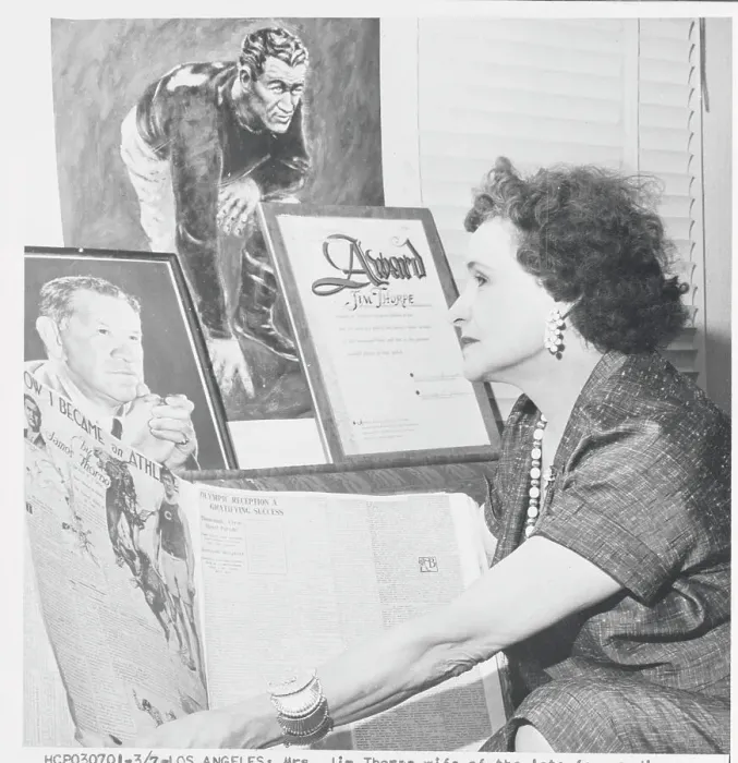 Framed Print : Mrs. Jim Thorpe Gazing at Husband's Photograph Framed Print : Mrs. Jim Thorpe Gazing at Husband's Photograph