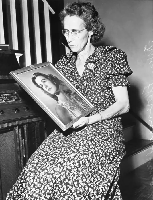 Framed Print : Mrs. Spangler Holds Portrait of Missing Daughter
