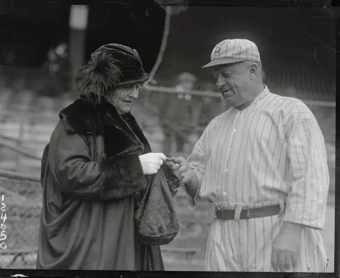Framed Print : Mrs. Wilbert Robinson Gives Husband a Medal Framed Print : Mrs. Wilbert Robinson Gives Husband a Medal