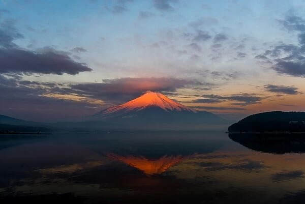 Mt. Fuji. Dawn of Lake Yamanakako. The surface of the lake reflects Mt