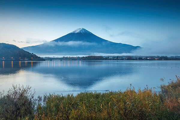 Mt. Fuji reflected in Lake Kawaguchi with clouds