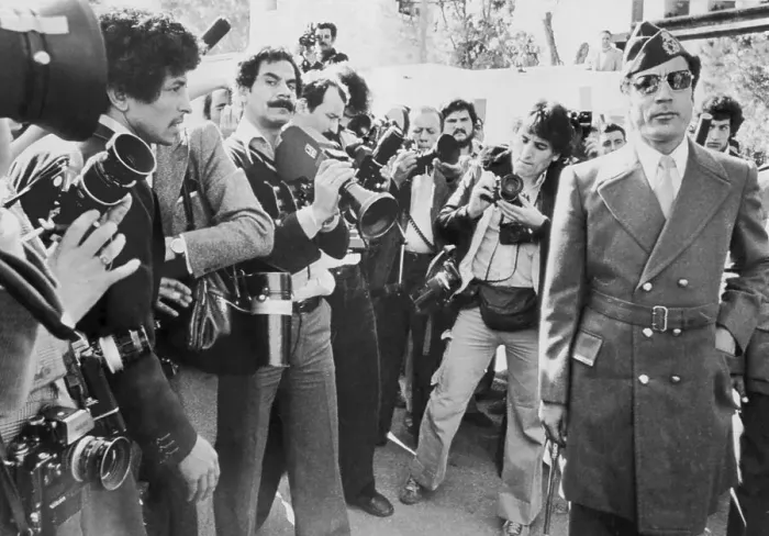 Framed Print : Muammar al-Qaddafi passing photographers Framed Print : Muammar al-Qaddafi passing photographers