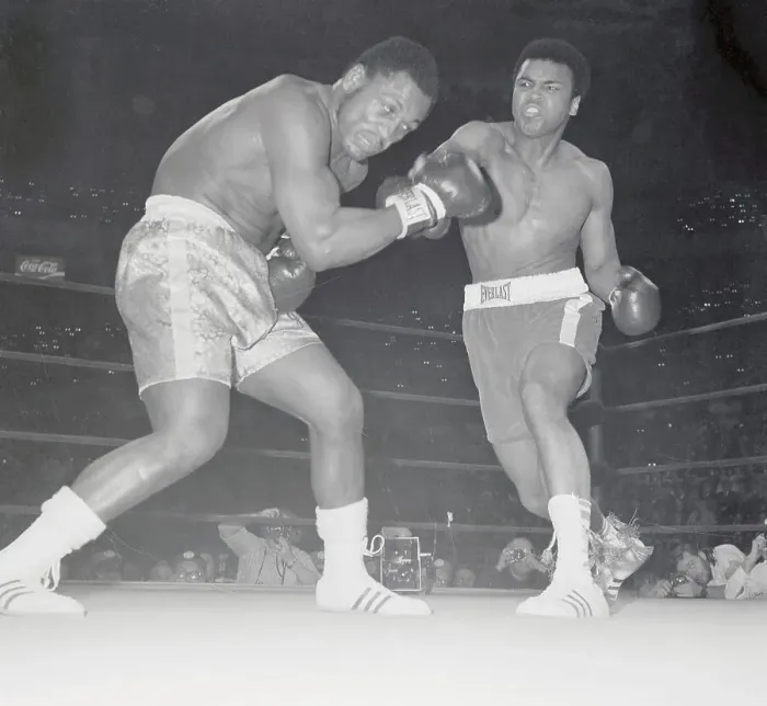 Framed Print : Muhammad Ali Attacking Joe Frazier Framed Print : Muhammad Ali Attacking Joe Frazier